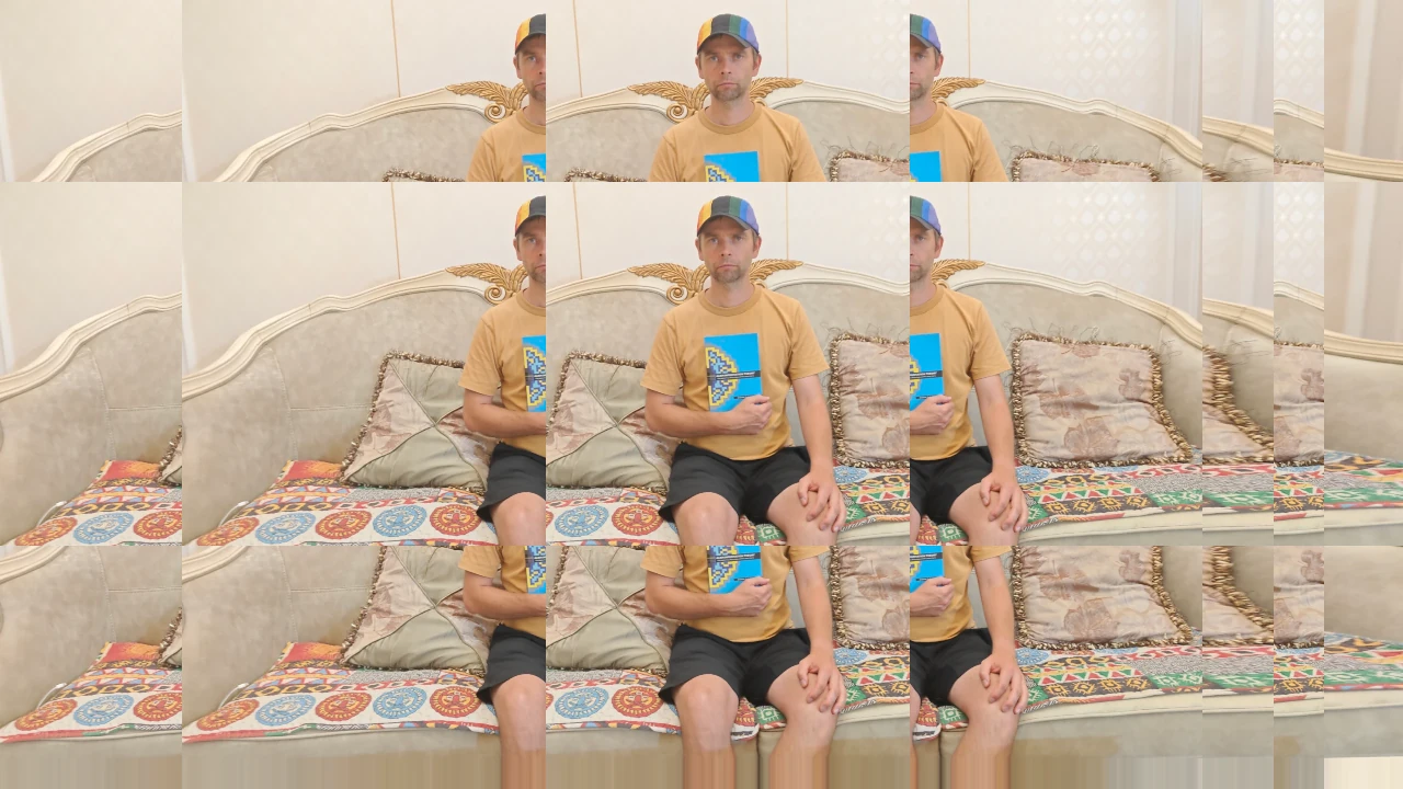 Me sitting on a sofa with the book in my hands.